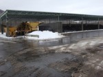 <p>Following the dewatering system, sludge cake is transferred to an on-site composting facility, where it is stabilized for beneficial reuse. &nbsp;The on-site composting facility was originally constructed in 1983, upgraded in 1992, and expanded in 1997. &nbsp;Prior to 1983, co-settled sludge was dewatered using vacuum filters, and the dewatered sludge was hauled off-site for landfill disposal. &nbsp;</p>